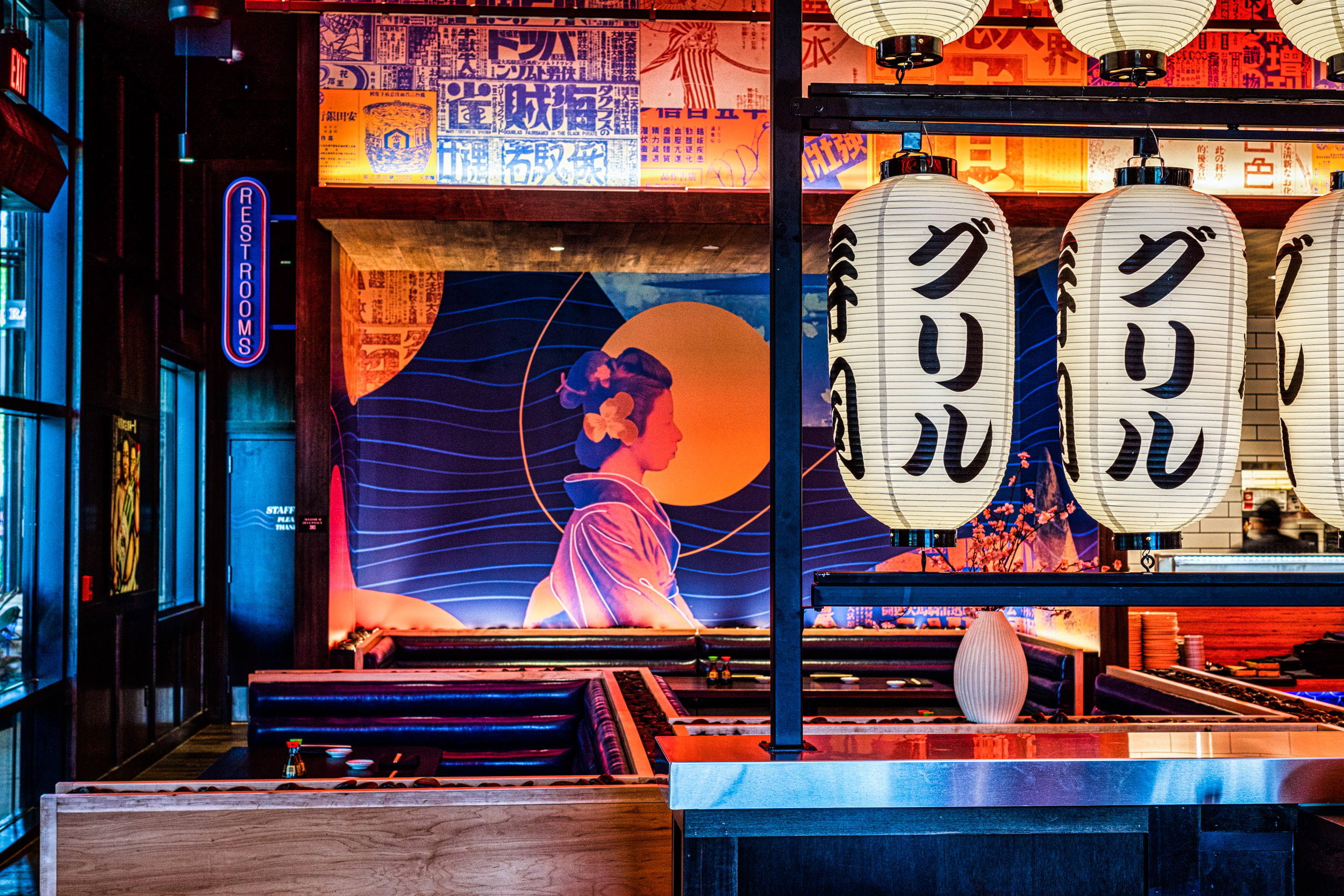 A close up of a mural wall inside of Blue Sushi Sake Grill.