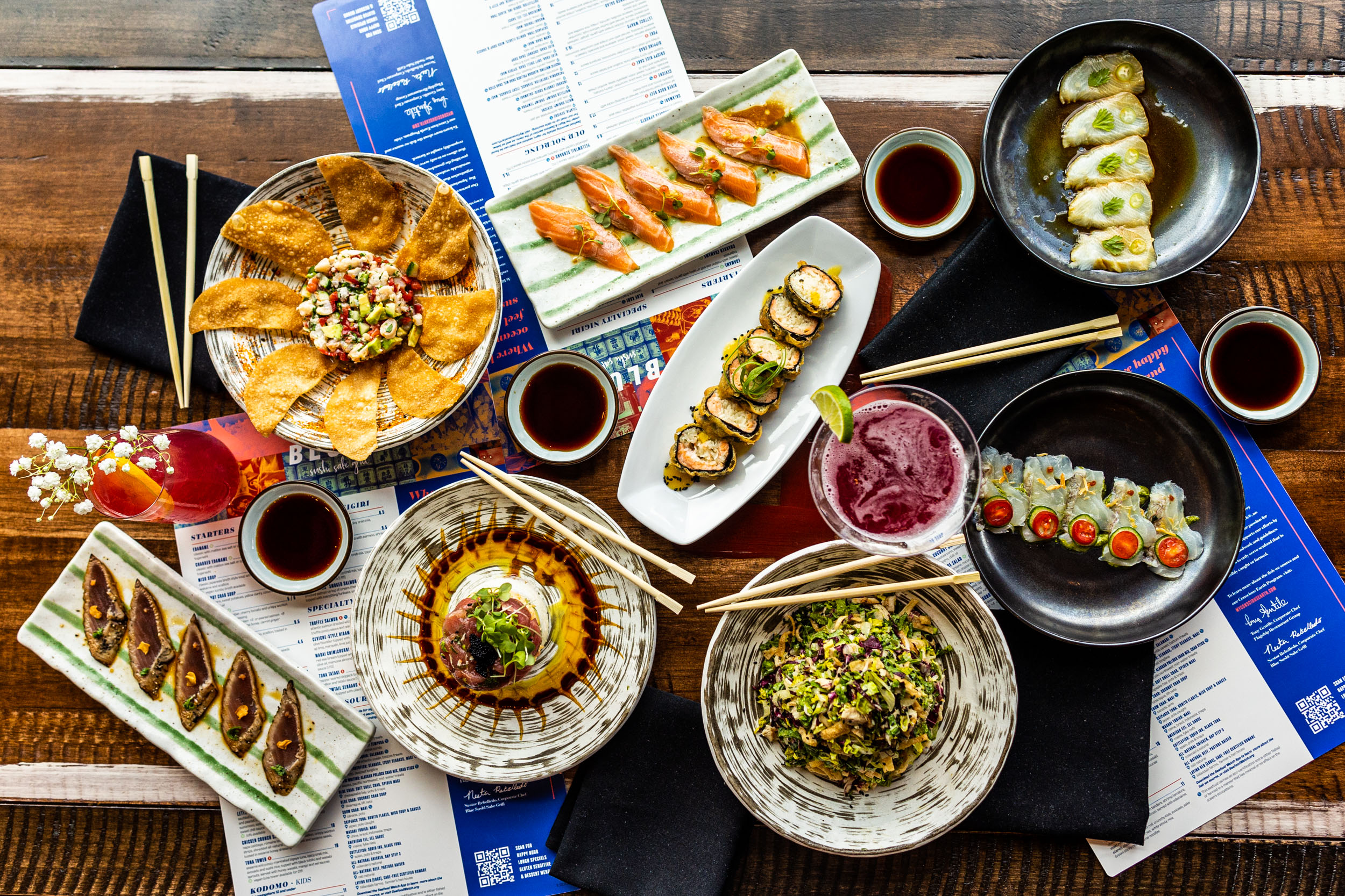 A colorful platter of sushi rolls, sashimi, and nigiri, beautifully arranged and ready to be devoured.